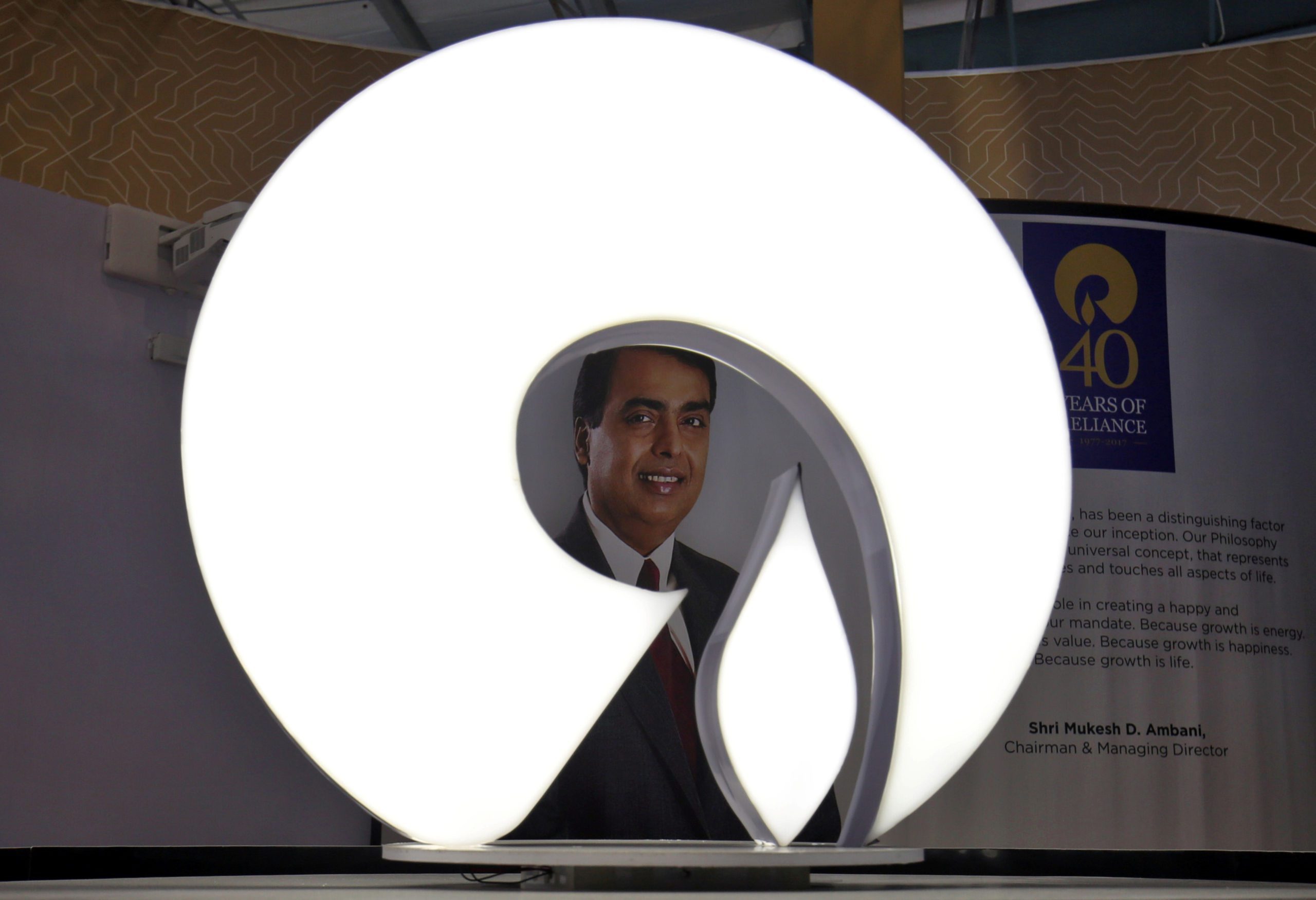 The logo of Reliance Industries is pictured in a stall at the Vibrant Gujarat Global Trade Show at Gandhinagar, India, January 17, 2019. REUTERS/Amit Dave - RC1775A352A0