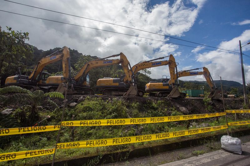 Excavators are parked near a damaged section of oil pipeline, about 25 km from the city of Tena in the Amazon, El Reventador, Sucumbios Province, Ecuador, June 19, 2020. Pipelines ruptured in the area on April 7, 2020, led to one of Ecuador's worst oil spills in years. Ivan Castaneira/Agencia Tegantai/Handout via REUTERS