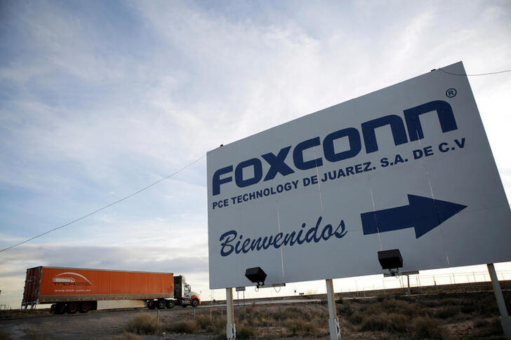 FILE PHOTO: A sign announces the manufacturing complex of Foxconn PCE Technology, in Ciudad Juarez, Mexico February 6, 2020. Picture taken February 6, 2020. REUTERS/Jose Luis Gonzalez/File Photo