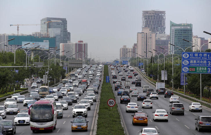 FILE PHOTO: Cars are pictured during the morning rush hour in Beijing, China, July 2, 2019. REUTERS/Jason Lee/File Photo
