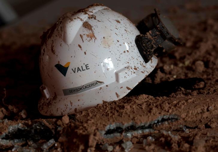 A helmet with a logo of Vale SA is seen in a collapsed tailings dam owned by the company, in Brumadinho, Brazil February 13, 2019. REUTERS/Washington Alves