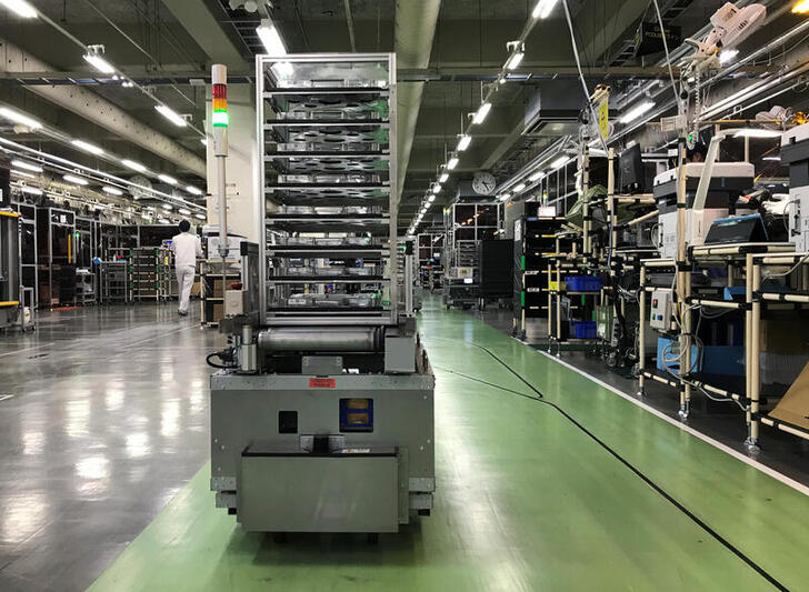 A self-driving vehicle with parts is pictued at Ricoh?fs photocopier components factory in Atsugi, Kanagawa prefecture, Japan July 13, 2020. Picture taken July 13, 2020.  REUTERS/Naomi Tajitsu