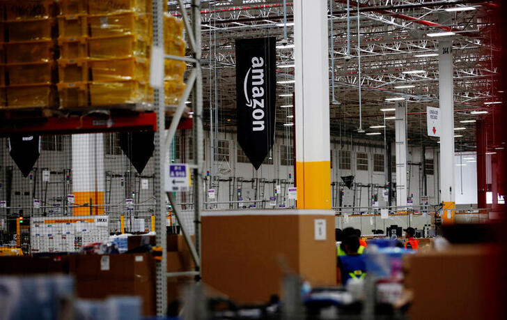 FILE PHOTO: The logo of Amazon is seen at their new Amazon warehouse during its opening announcement on the outskirts of Mexico City, Mexico July 30, 2019. Picture taken July 30 2019. REUTERS/Carlos Jasso/File Photo