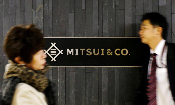 FILE PHOTO: People walk past the logo of Japanese trading company Mitsui & Co in Tokyo, Japan, Jan. 10, 2018. REUTERS/Toru Hanai/File Photo