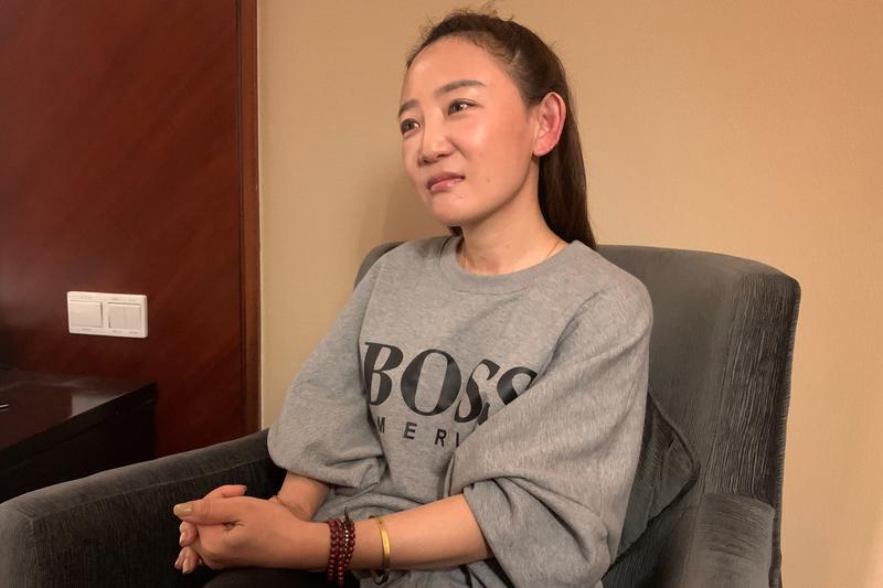 Yuan Xiaoliang, wife of Australian writer Yang Hengjun, talks to Reuters in Shanghai, China October 19, 2020. Picture taken October 19, 2020. REUTERS/Stringer