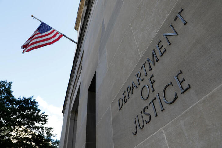 FILE PHOTO: Signage is seen at the United States Department of Justice headquarters in Washington, D.C., U.S., August 29, 2020. REUTERS/Andrew Kelly/File Photo