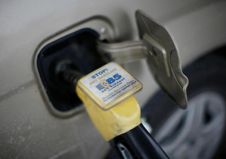 FILE PHOTO: E85 ethanol fuel is shown being pumped into a vehicle at a gas station selling alternative fuels in the town of Nevada, Iowa, December 6, 2007. REUTERS/Jason Reed/File Photo