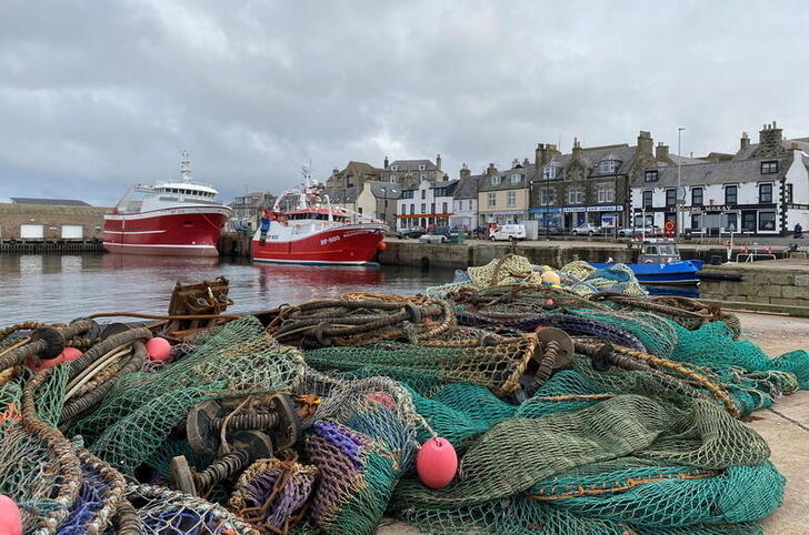 View of fishing boats and a net in the coastal town of Macduff, Aberdeenshire, Scotland, Britain October 18, 2020. Picture taken October 18, 2020. REUTERS/Alexander Smith