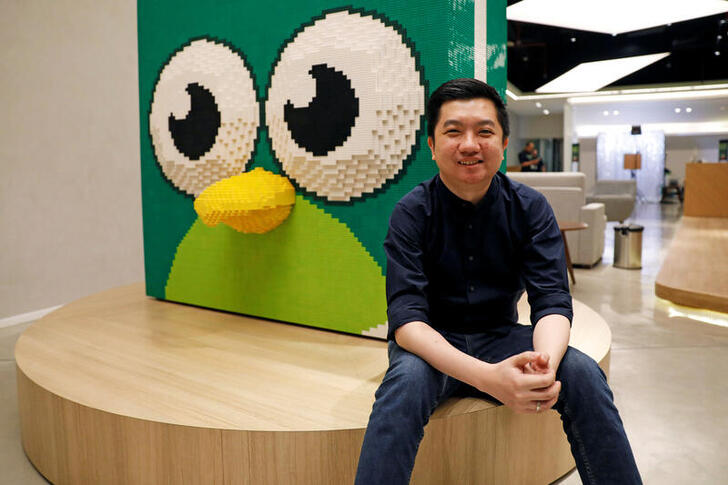 FILE PHOTO: Founder and CEO of Indonesian e-commerce firm Tokopedia, William Tanuwijaya, poses for a photograph at Tokopedia headquarters in Jakarta, Indonesia, July 25, 2019. Picture taken July 25, 2019. REUTERS/Willy Kurniawan/File Photo