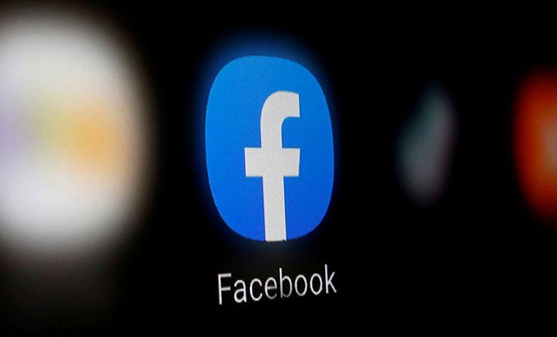 FILE PHOTO: A Facebook logo is displayed on a smartphone in this illustration taken January 6, 2020. REUTERS/Dado Ruvic/Illustration/File Photo - RC2KKG9Z067U