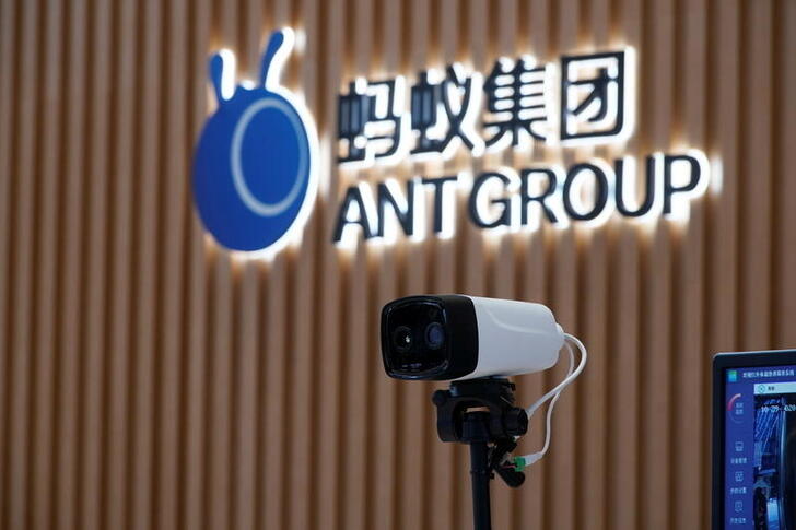 A thermal imaging camera is seen in front of a logo of Ant Group at the headquarters of Ant Group, an affiliate of Alibaba, in Hangzhou, Zhejiang province, China October 29, 2020. Picture taken October 29, 2020.   REUTERS/Aly Song