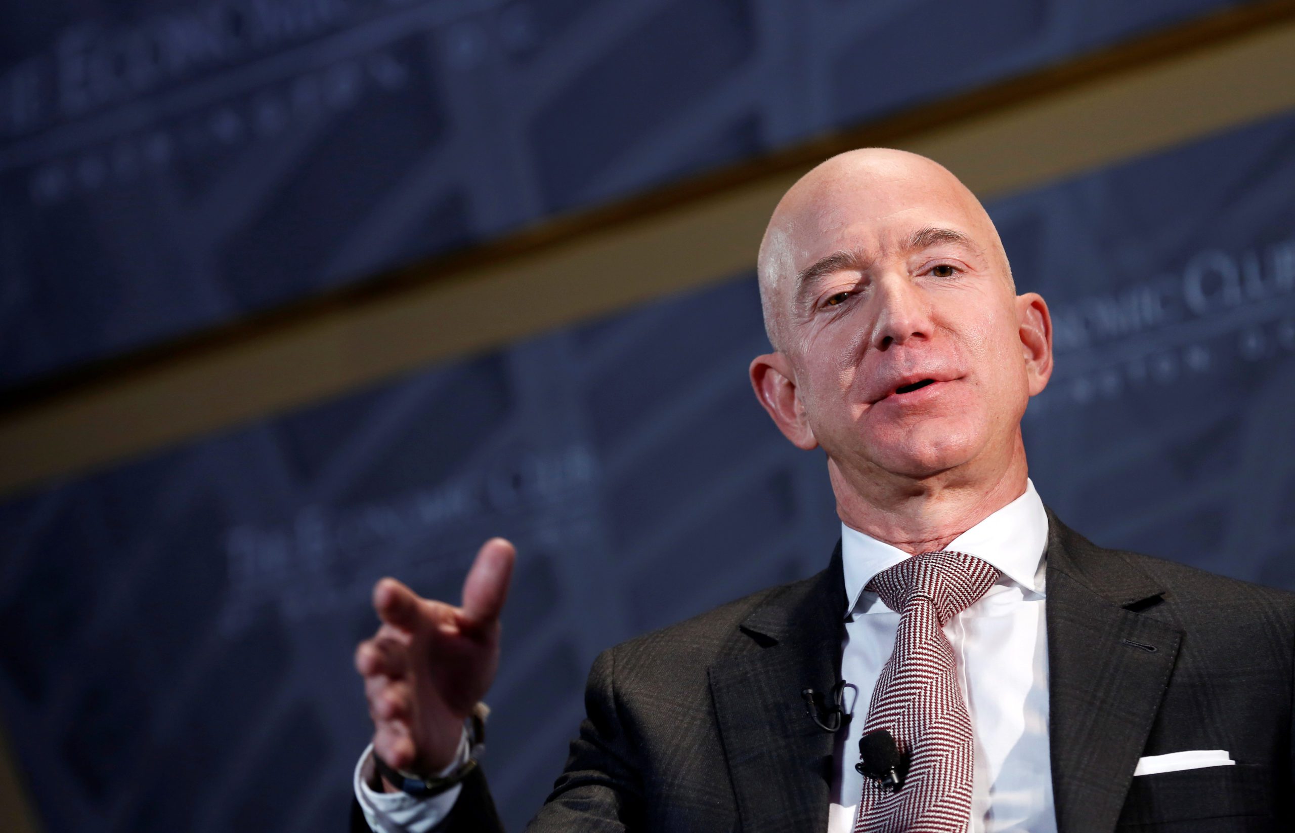 FILE PHOTO: Jeff Bezos, president and CEO of Amazon and owner of The Washington Post, speaks at the Economic Club of Washington DC's 