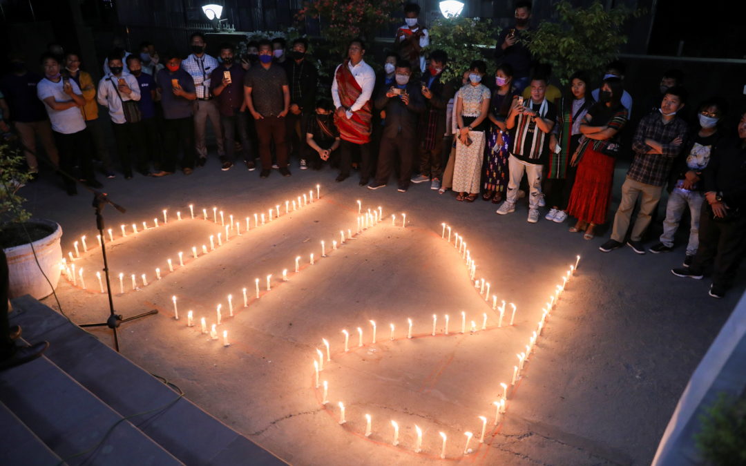 Candle vigil to pay tribute to people who died in Myanmar after the military coup, in New Delhi