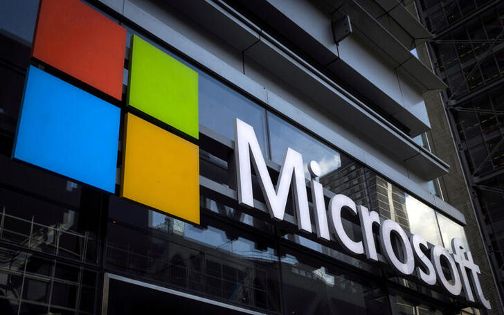 FILE PHOTO: A Microsoft logo is seen on an office building in New York City on July 28, 2015. REUTERS/Mike Segar/File Photo/File Photo/File Photo
