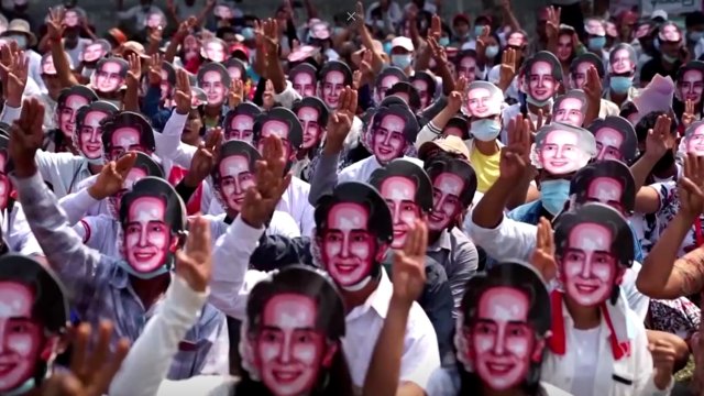 Yangon protesters wear Aung San Suu Kyi masks, demand her release