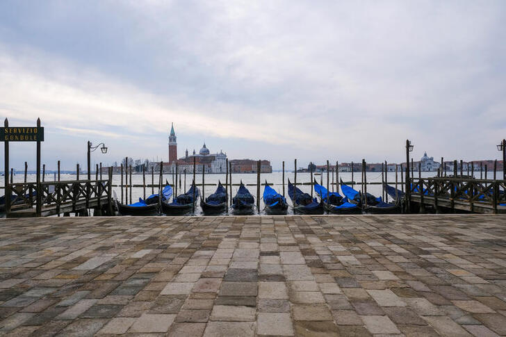 FILE PHOTO: A view of the empty St. Mark's Basin as the region of Veneto becomes a 'red zone', going into lockdown in an effort to reduce coronavirus disease (COVID-19) infections in the country, in Venice, Italy, March 15, 2021. REUTERS/Manuel Silvestri/File Photo