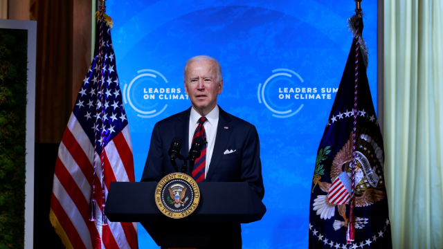 U.S. pledges to halve its emissions by 2030 as Biden opens climate summit