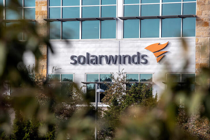 FILE PHOTO: The SolarWinds logo is seen outside its headquarters in Austin, Texas, U.S., December 18, 2020. REUTERS/Sergio Flores/File Photo/File Photo