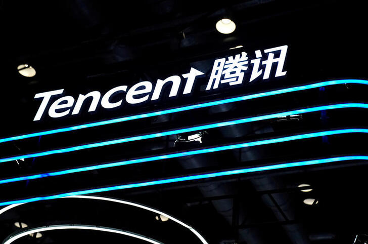 FILE PHOTO: A Tencent logo is seen at its booth at the 2020 China International Fair for Trade in Services (CIFTIS) in Beijing, China September 4, 2020. REUTERS/Tingshu Wang/File Photo