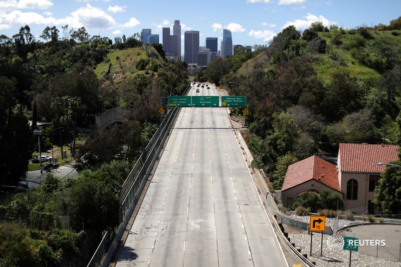 The 110 freeway leading into downtown Los Angeles is emptier than usual after California issued a stay-at-home order due to coronavirus disease (COVID-19) in Los Angeles, California, U.S., March 23, 2020.  REUTERS/Lucy Nicholson