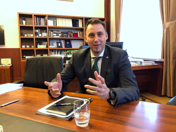 National Bank of Hungary deputy governor, Barnabas Virag, talks to reporters as the bank prepares to tighten monetary policy to tackle inflation risks, in Budapest, Hungary May 17, 2021. REUTERS/Krisztina Than