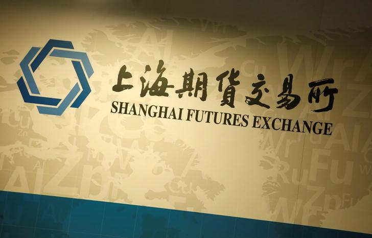 A company logo of Shanghai Futures Exchange is displayed at a booth during LME Week Asia in Hong Kong, China June 14, 2016. REUTERS/Bobby Yip