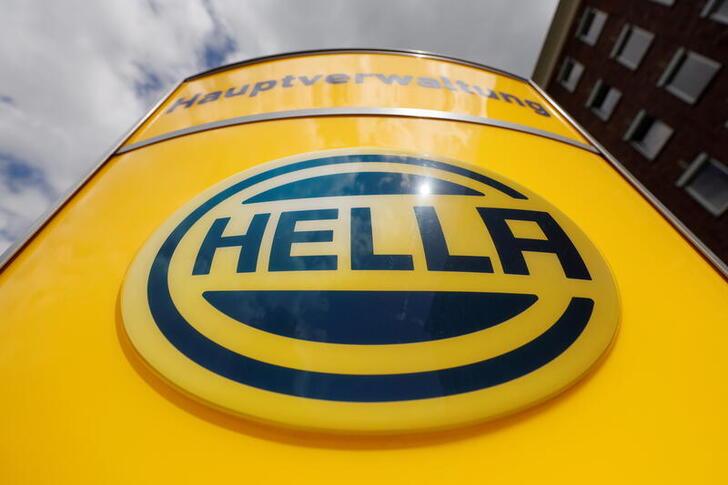 FILE PHOTO: The logo of Hella, a global developer and manufacturer for the automotive industry, is seen at the headquarters of Hella in Lippstadt, Germany, May 12, 2019. REUTERS/Wolfgang Rattay/File Photo