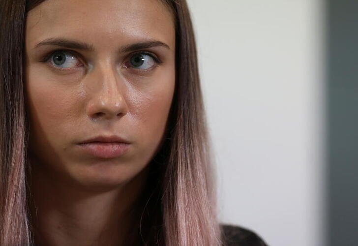Belarusian sprinter Krystsina Tsimanouskaya, who left the Olympic Games in Tokyo and seeks asylum in Poland, attends a news conference in Warsaw, Poland August 5, 2021. Maciek Jazwiecki/Agencja Gazeta via REUTERS  ATTENTION EDITORS - THIS IMAGE WAS PROVIDED BY A THIRD PARTY. POLAND OUT. NO COMMERCIAL OR EDITORIAL SALES IN POLAND.