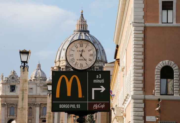 A McDonald's sign is seen at Via della Conciliazione street in Rome, Italy in front of Vatican City's St. Peter's Square January 3, 2017. REUTERS/Alessandro Bianchi