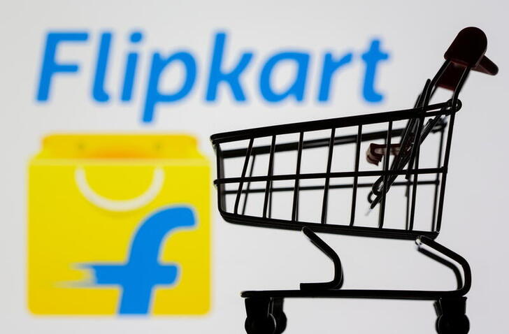 FILE PHOTO: Small toy shopping cart is seen in front of displayed Flipkart logo in this illustration taken, July 30, 2021. REUTERS/Dado Ruvic/Illustration/File Photo
