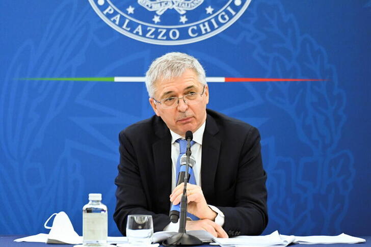 Italy's Economy Minister Daniele Franco speaks during a joint news conference with Italy's Prime Minister and Italy's Minister for Labour and Social Policy after a cabinet meeting in Rome, Italy, March 19, 2021. Alberto Pizzoli/Pool via REUTERS