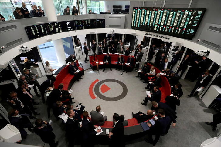 FILE PHOTO: Traders work on the floor of the London Metal Exchange in London, Britain, September 27, 2018. REUTERS/Simon Dawson//File Photo