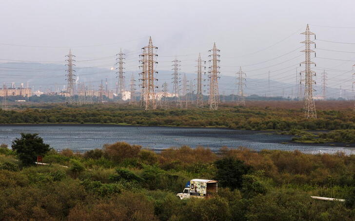 A general view of electricity pylons in Mumbai, India, October 13, 2021. REUTERS/Francis Mascarenhas