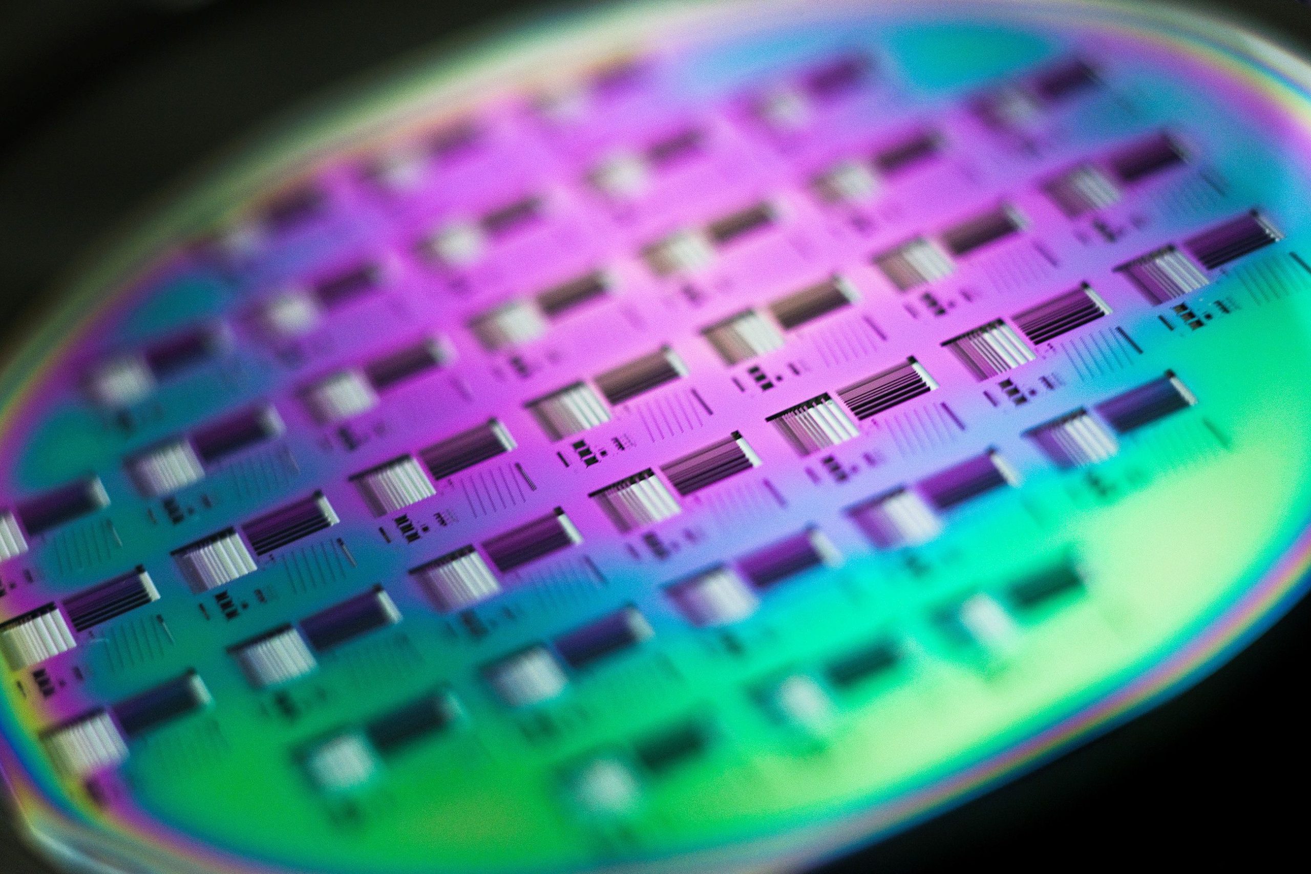 FILE PHOTO: A silicon wafer is pictured during the media presentation of the Guardian Angels project in one of the low particle pollution nanofabrication clean rooms of the Swiss Federal Institute of Technology  in Ecublens
