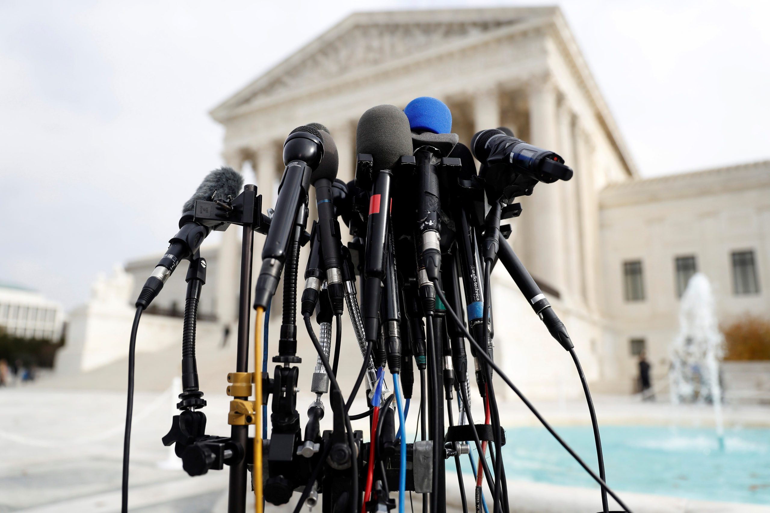 Microphones are assembled during oral arguments in the Masterpiece Cakeshop vs. Colorado Civil Rights Commission case at the Supreme Court in Washington, U.S., December 5, 2017. REUTERS/Aaron P. Bernstein - RC18E46EA940
