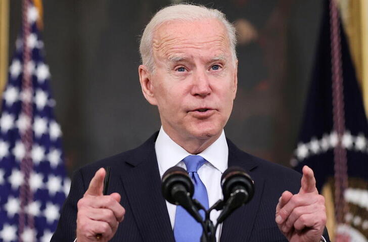 U.S. President Joe Biden delivers remarks on the state of his American Rescue Plan from the State Dining Room at the White House in Washington, D.C., U.S., May 5, 2021. REUTERS/Jonathan Ernst