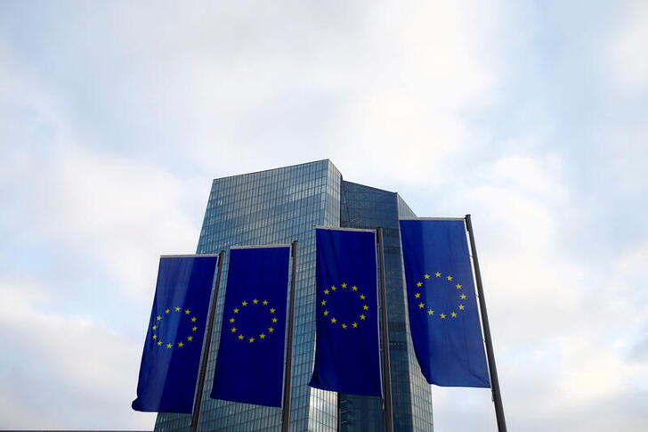 FILE PHOTO: European Union (EU) flags fly in front of the European Central Bank (ECB) headquarters in Frankfurt, Germany, December 3, 2015. REUTERS/Ralph Orlowski/File Photo