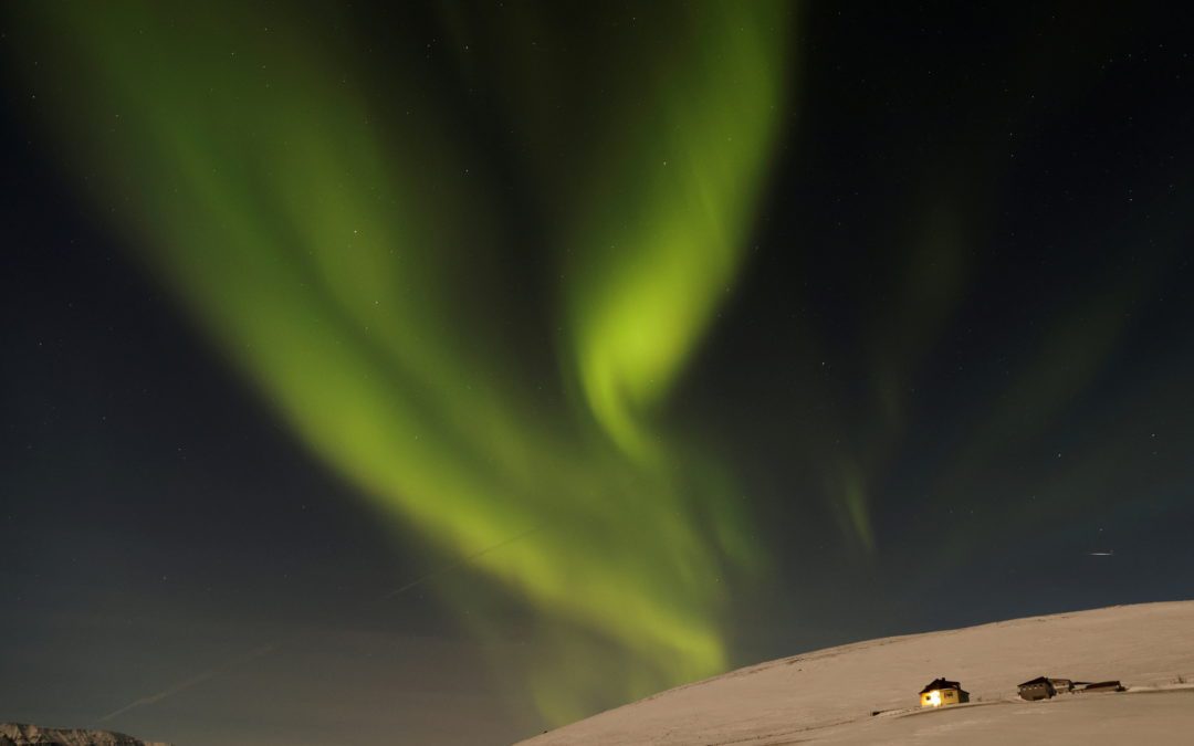 An aurora is seen in the sky during winter in Husavik