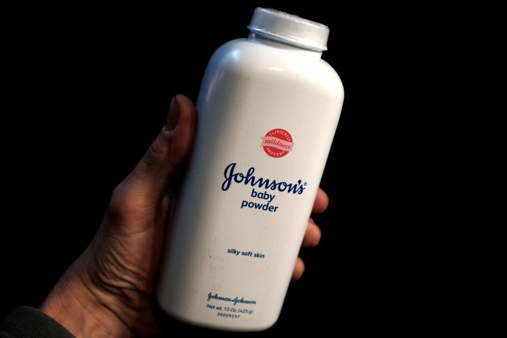 A bottle of Johnson and Johnson Baby Powder is seen in a photo illustration taken in New York, February 24, 2016. Consumers expressed concern on social media about a talc-based baby powder made by Johnson & Johnson on Wednesday after a Missouri jury ordered the company to pay $72 million in damages to the family of a woman who said her death from cancer was linked to use of the product.  REUTERS/Mike Segar/Illustration