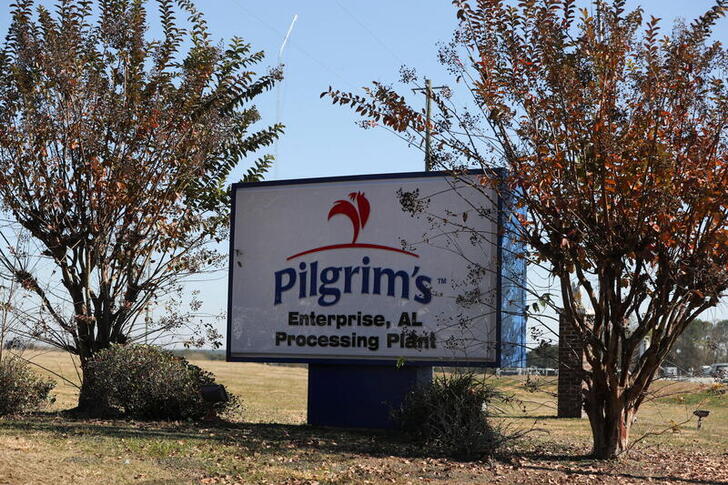 Signage outside of a Pilgrim's poultry processing plant in Enterprise, Alabama, U.S., November 30, 2021. Picture taken November 30, 2021. REUTERS/Alyssa Pointer To match Special Report USA-IMMIGRATION/ALABAMA