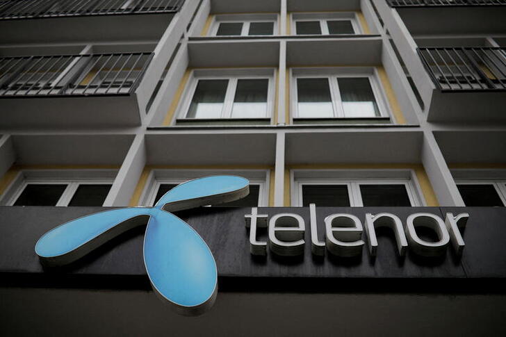 FILE PHOTO: Telenor's logo is seen in central Belgrade, Serbia, March 21, 2018. REUTERS/Marko Djurica/File Photo