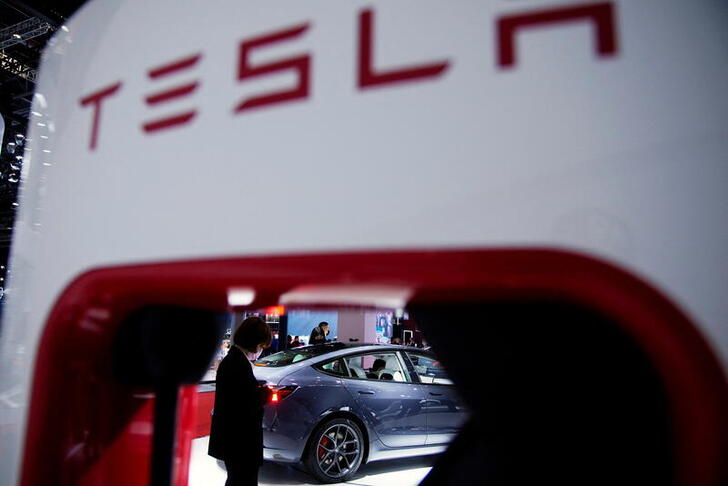 FILE PHOTO: A Tesla electric vehicle in Shanghai, China April 20, 2021. REUTERS/Aly Song/File Photo