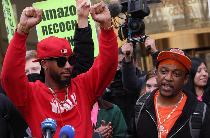 Amazon Labour Union (ALU) organizer Gerald Bryson speaks to the media as ALU members celebrate official victory after hearing results regarding the vote to unionize, outside the NLRB offices in Brooklyn, New York City, U.S., April 1, 2022. Picture take April 1, 2022.  REUTERS/Brendan McDermid