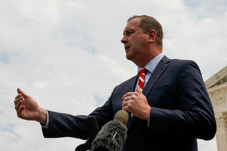 Missouri Attorney General Eric Schmitt speaks during a news conference after the U.S. Supreme Court heard oral arguments in President Joe Biden's bid to rescind a Trump-era immigration policy that forced migrants to stay in Mexico to await U.S. hearings on their asylum claims, in Washington, U.S., April 26, 2022. REUTERS/Elizabeth Frantz