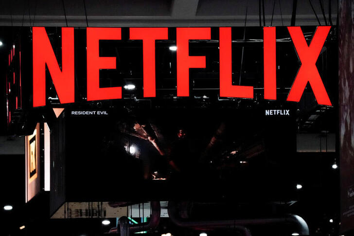 Signage at the Netflix booth is seen on the convention floor at Comic-Con International in San Diego, California, U.S., July 21, 2022. REUTERS/Bing Guan