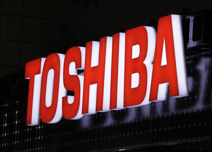 A view shows Toshiba Corp's logo at the fourth International Photovoltaic Power Generation (PV) Expo in Tokyo March 2, 2011. More than 600 companies in the solar energy business from 18 countries are taking part in the March 2-4 expo, which showcases firms and products related to photovoltaic power generation, according to the organiser. REUTERS/Yuriko Nakao (JAPAN - Tags: BUSINESS ENVIRONMENT SCI TECH)