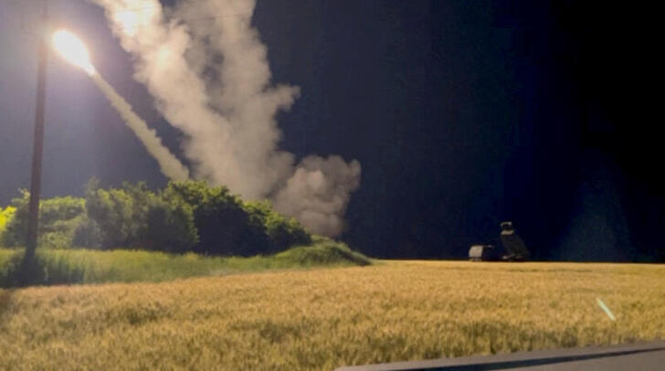 FILE PHOTO: A view shows a M142 High Mobility Artillery Rocket System (HIMARS) is being fired in an undisclosed location, in Ukraine in this still image obtained from an undated social media video uploaded on June 24, 2022 via Pavlo Narozhnyy/via REUTERS/File Photo