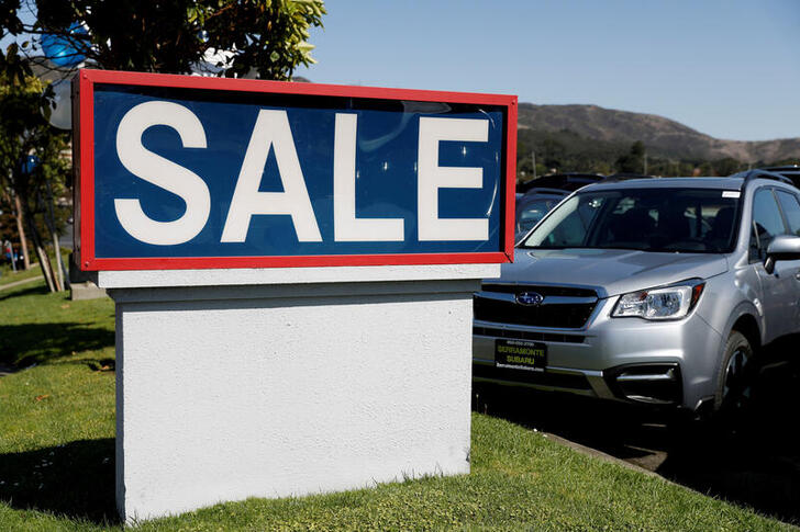 FILE PHOTO: Automobiles are shown for sale at a car dealership in Carlsbad, California, U.S. May 2, 2016. REUTERS/Mike Blake/File Photo