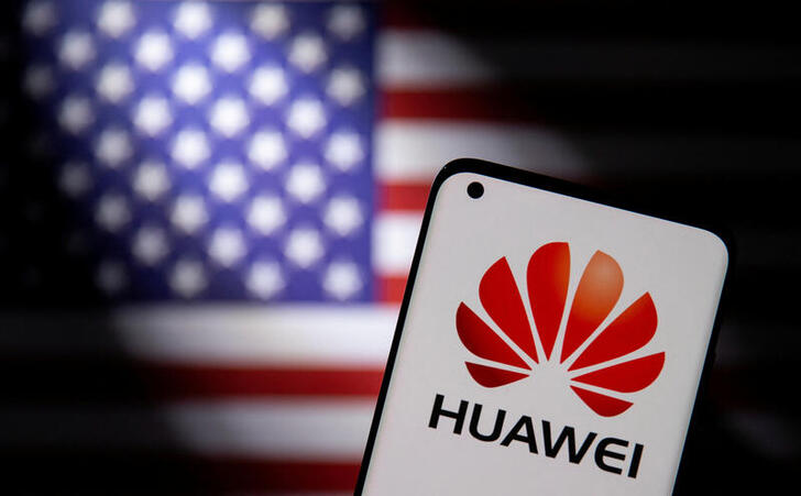 FILE PHOTO: Smartphone with a Huawei logo is seen in front of a U.S. flag in this illustration taken September 28, 2021. REUTERS/Dado Ruvic/Illustration/File Photo