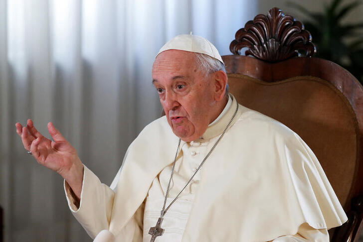 Pope Francis speaks during an exclusive interview with Reuters, at the Vatican, July 2, 2022. REUTERS/Remo Casilli